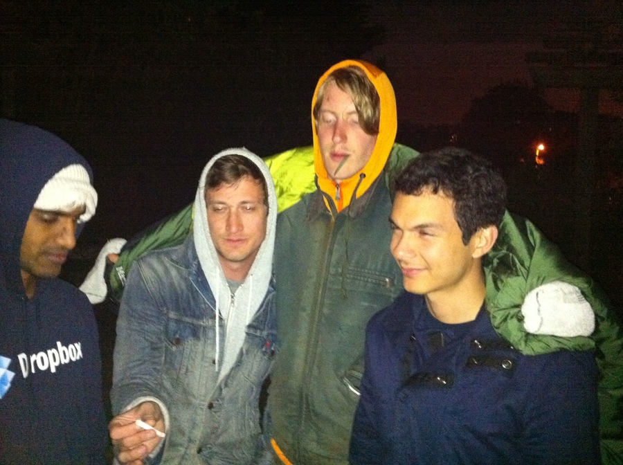 Eating garlic from the White Crane Springs Community Garden